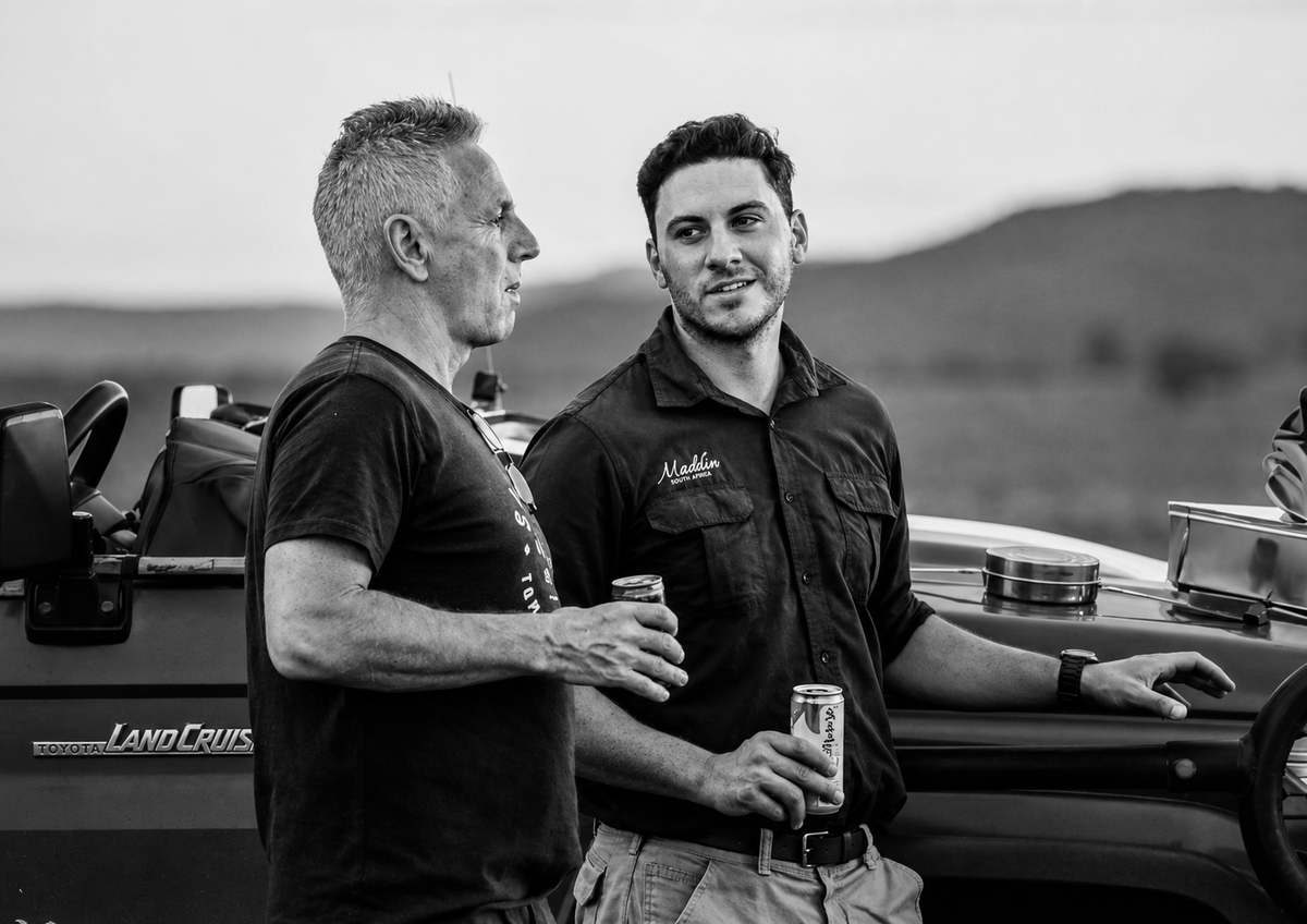 Dan Koopowitz guiding in Madikwe Game Reserve in conversation with a guest.